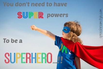 Superhero kid against blue sky background. Girl power concept